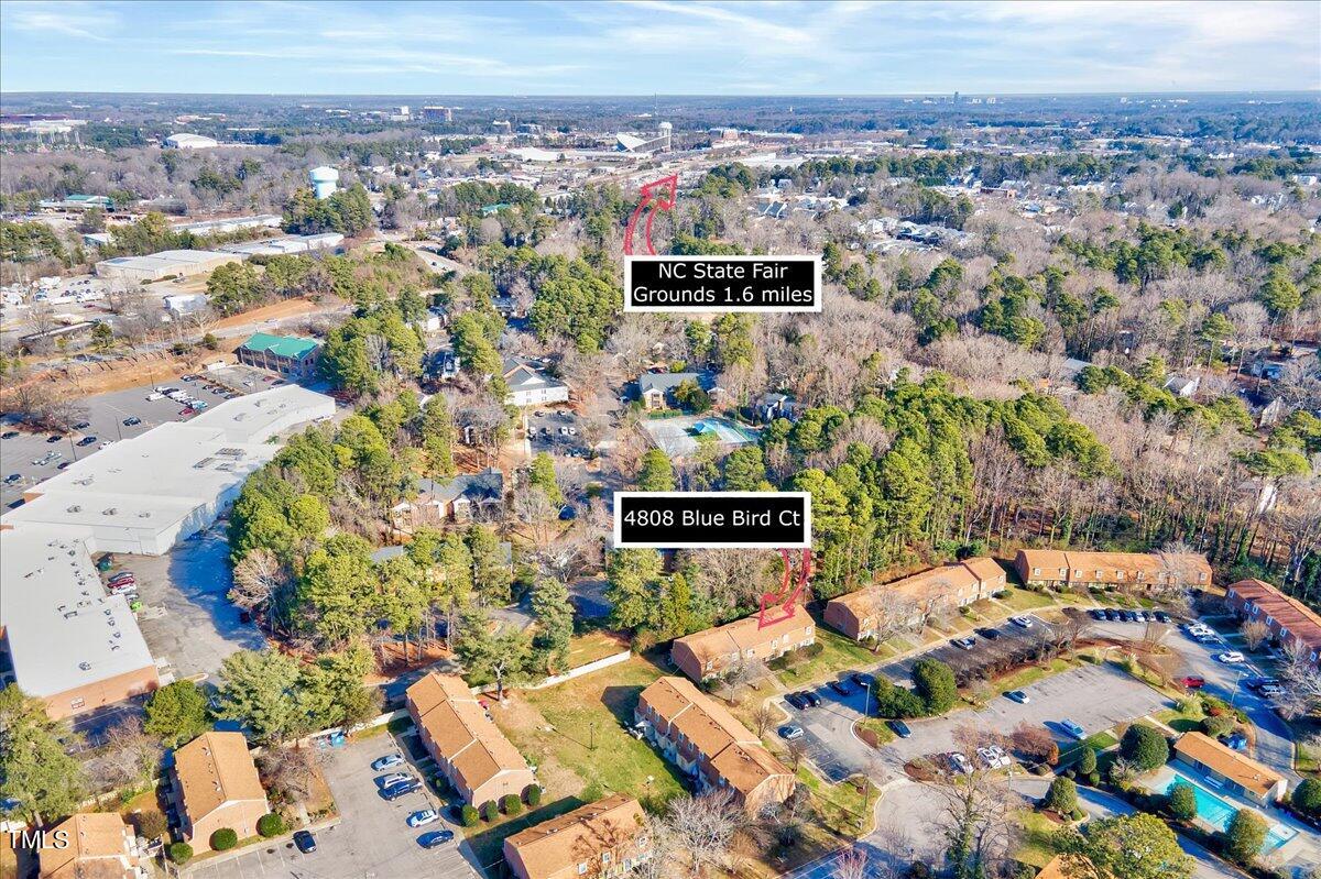 4808 Blue Bird Court, Unit D Raleigh, NC 27606 - Photo 26 of 31 an aerial view of a house with a yard
