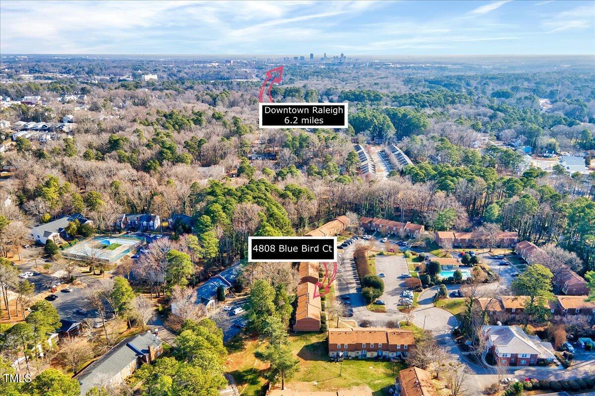 4808 Blue Bird Court, Unit D Raleigh, NC 27606 - Photo 27 of 31 an aerial view of multiple house