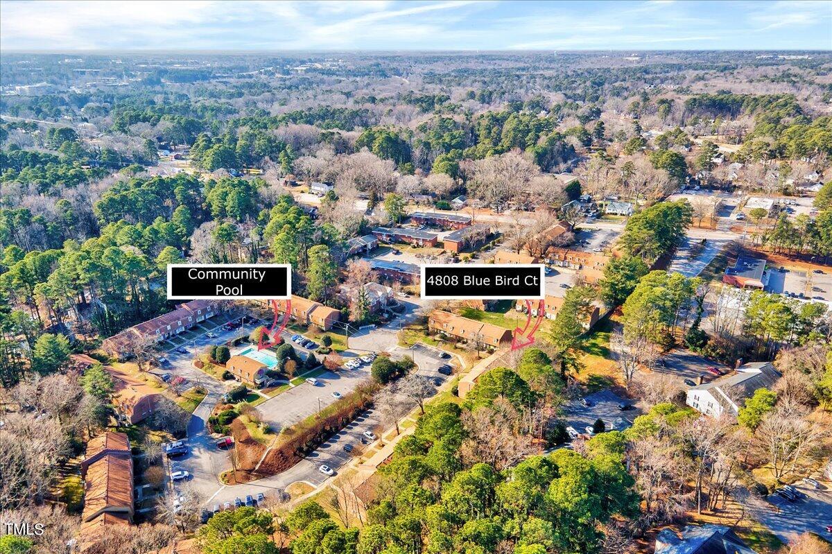4808 Blue Bird Court, Unit D Raleigh, NC 27606 - Photo 28 of 31 an aerial view of multiple house