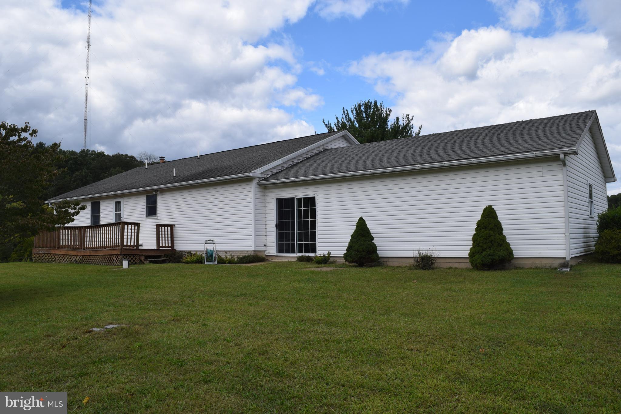 64 Cross Road Berkeley Springs, WV 25411 - Photo 3 of 30 a view of a house with a yard