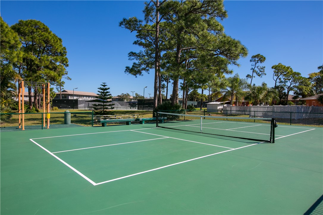 725 Timber Ridge Trail Southwest, Unit B Vero Beach, FL 32962 - Photo 26 of 27 a view of tennis court