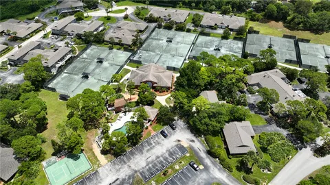 an aerial view of residential house with outdoor space