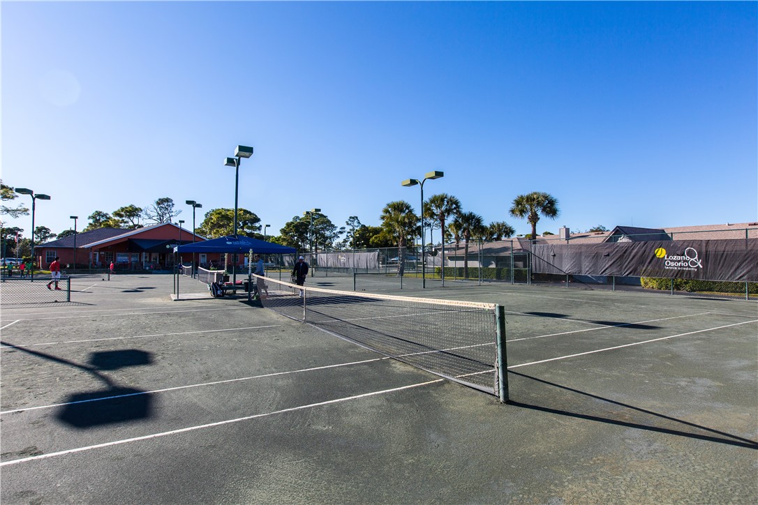 725 Timber Ridge Trail Southwest, Unit B Vero Beach, FL 32962 - Photo 34 of 36 a view of street with cars