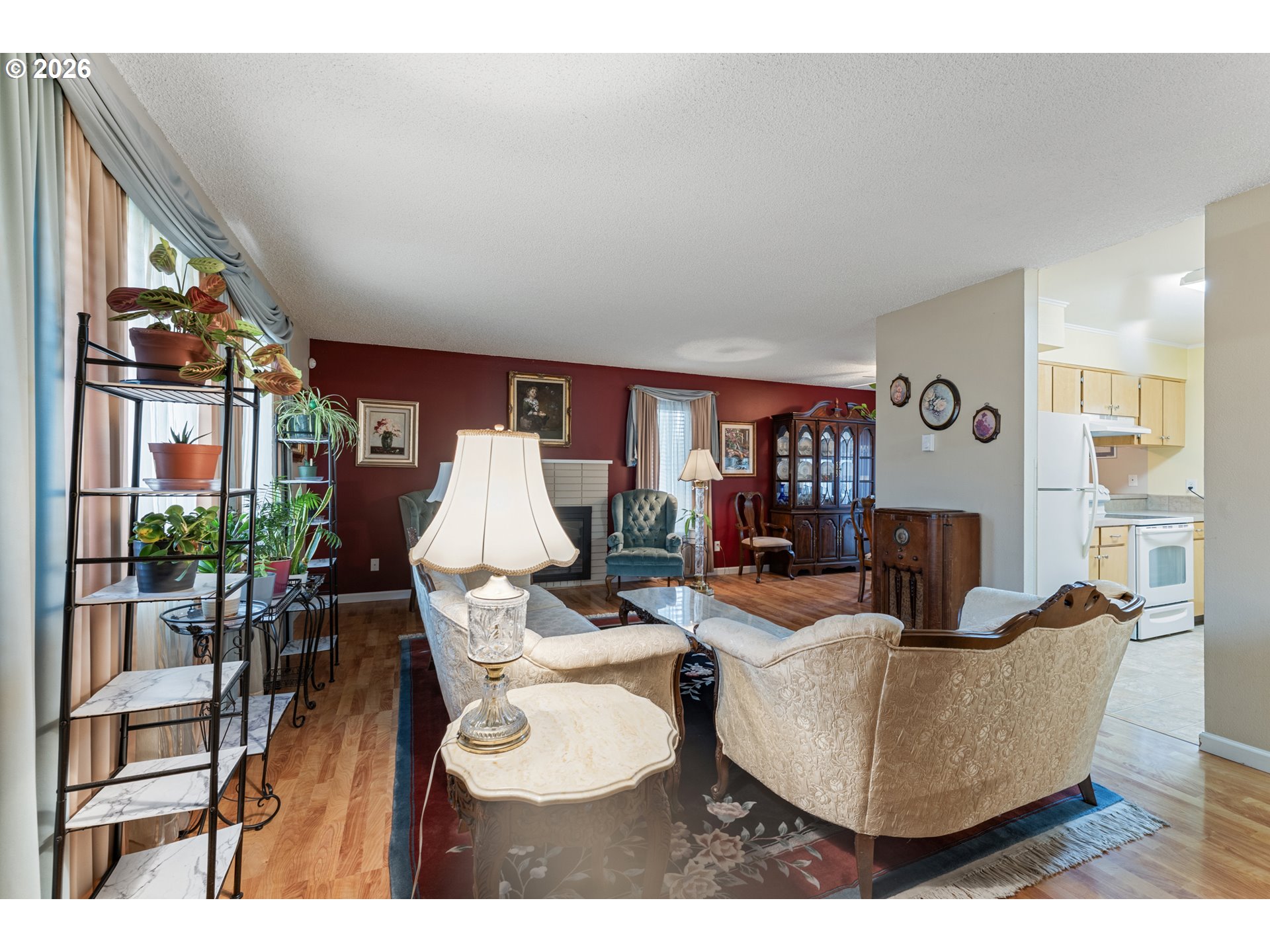 11341 Southwest Springwood Drive Portland, OR 97223 - Photo 5 of 26 a living room with furniture and a wooden floor