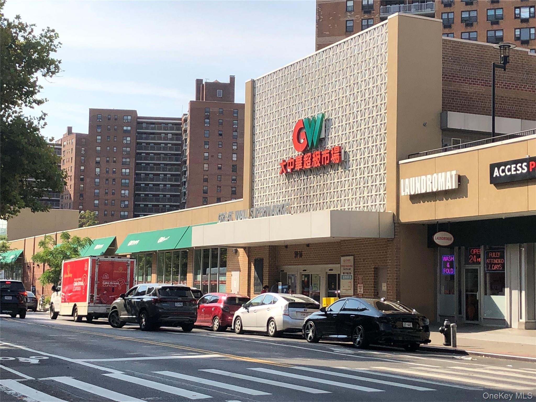 99-05 59th Avenue, Unit 6B Queens, NY 11368 - Photo 15 of 15 a car parked in front of a building