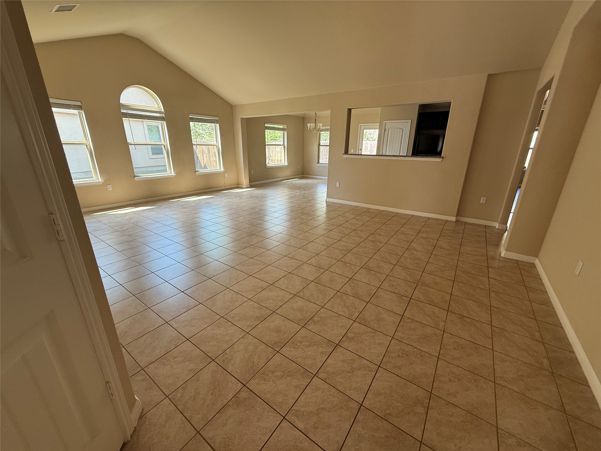 1441 Hamiltons Way Leander, TX 78641 - Photo 6 of 20 Empty room with baseboards and light tile patterned floors