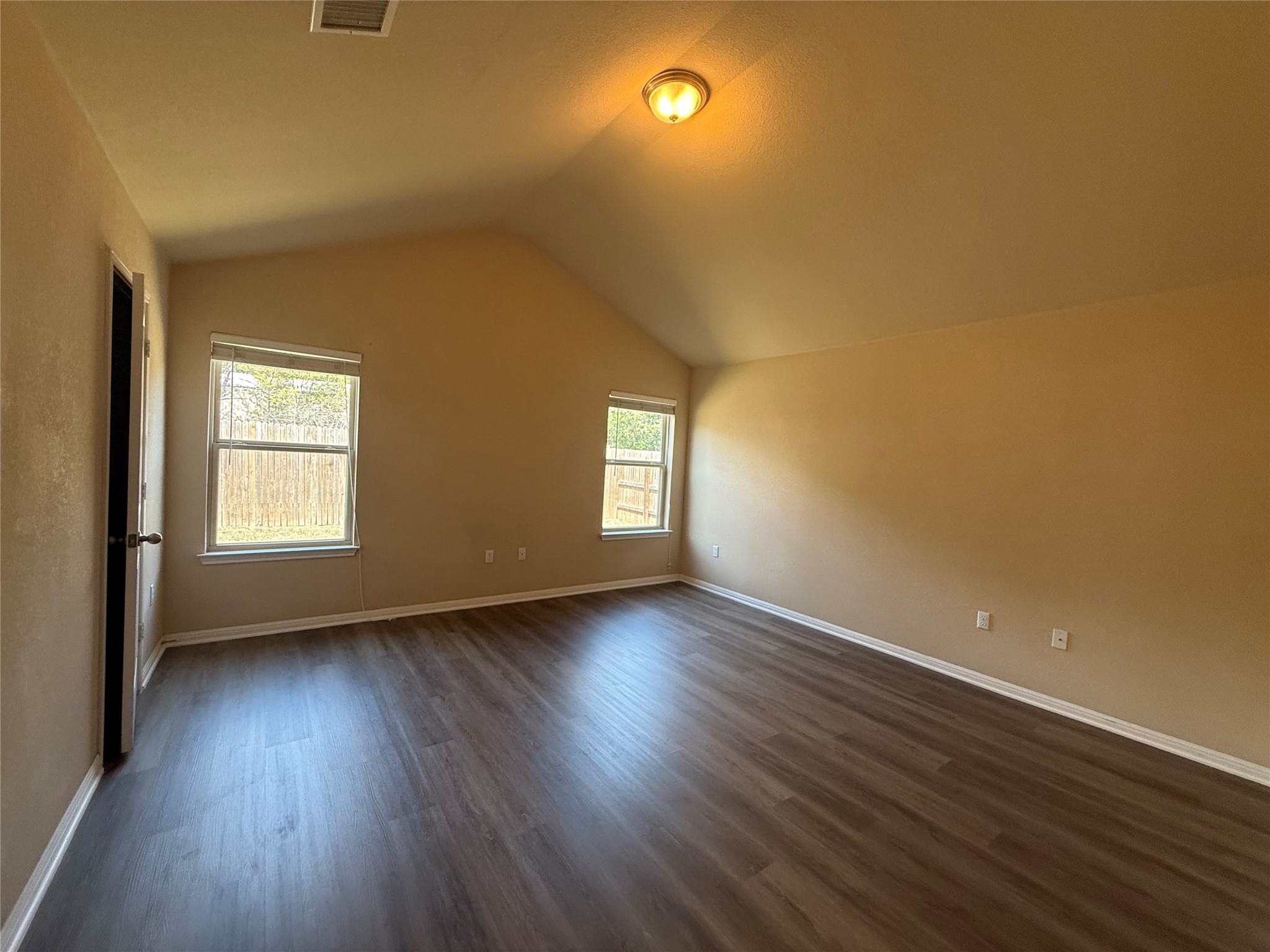 1441 Hamiltons Way Leander, TX 78641 - Photo 10 of 20 Additional living space featuring baseboards and dark wood-style floors