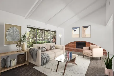 a living room with furniture and a large window