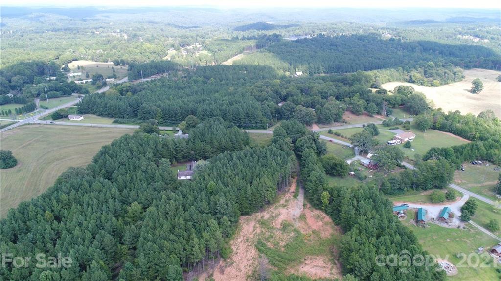 184 Pea Ridge Road Mill Spring, NC 28756 - Photo 13 of 13 an aerial view of multiple house