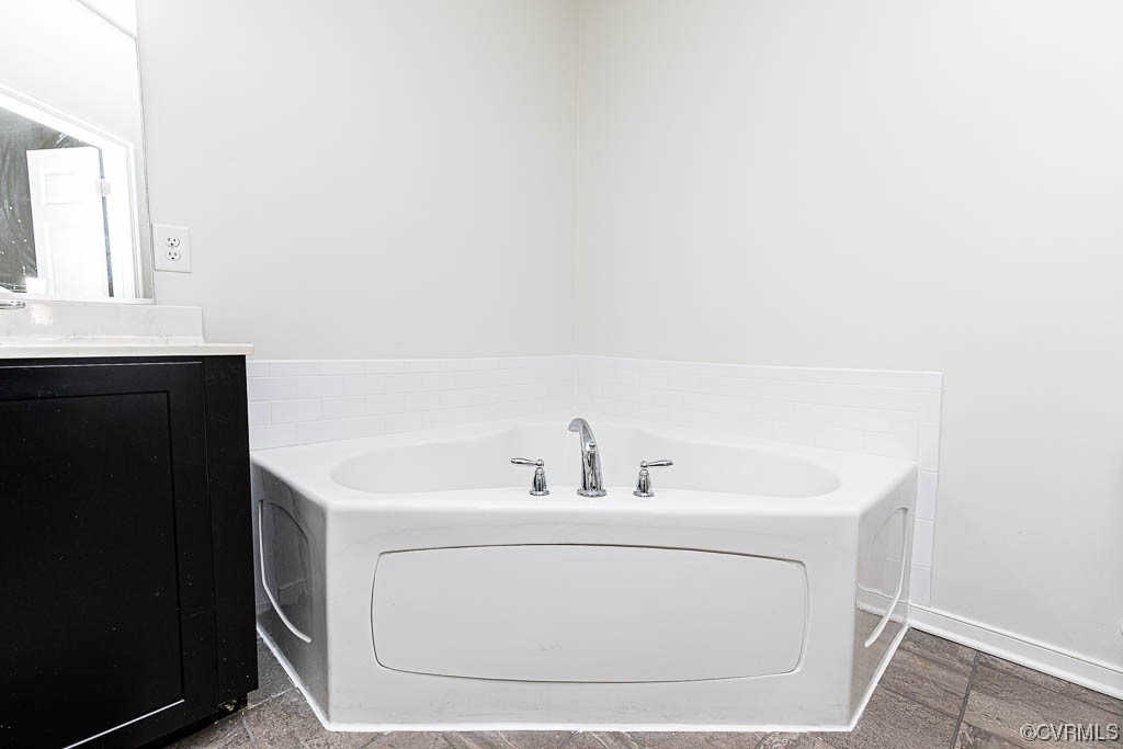 11100 Avening Road Midlothian, VA 23112 - Photo 18 of 29 a bathroom with a sink and a mirror