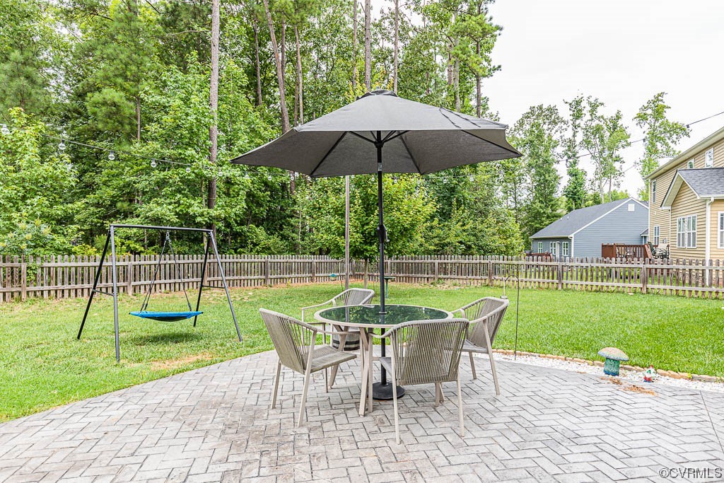 11100 Avening Road Midlothian, VA 23112 - Photo 27 of 29 a view of a chair and table in the yard