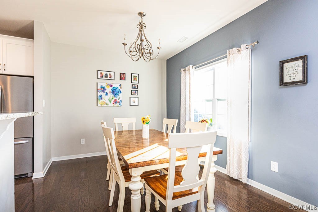 11100 Avening Road Midlothian, VA 23112 - Photo 8 of 29 a view of a dining room with furniture window and wooden floor