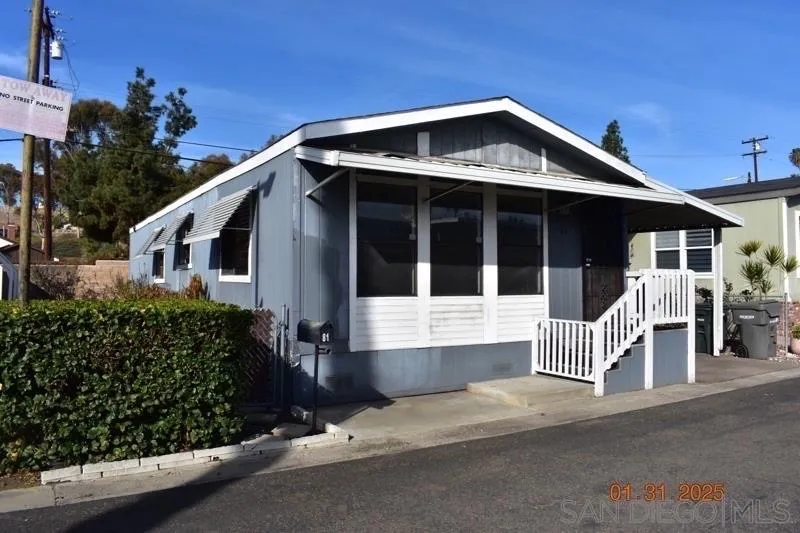 2515 Sweetwater Road, Unit 81 Spring Valley, CA 91977 - Photo 1 of 24 a front view of a house with a yard