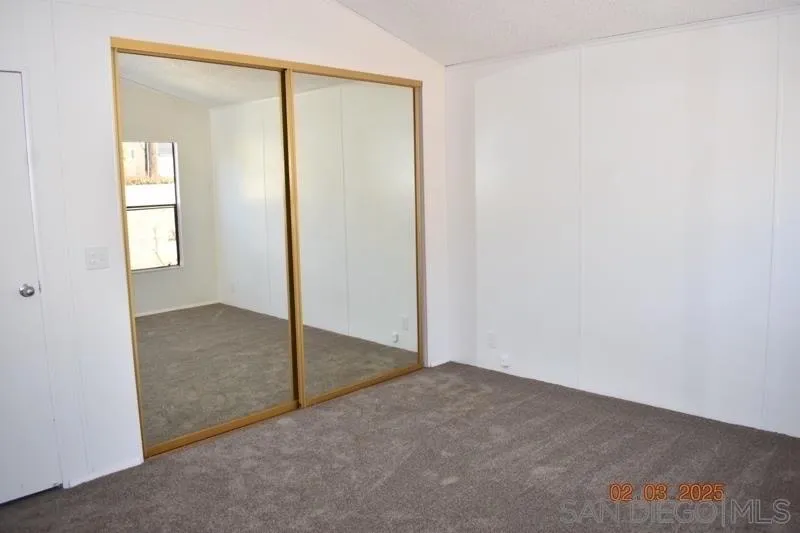 2515 Sweetwater Road, Unit 81 Spring Valley, CA 91977 - Photo 12 of 24 a view of an empty room with window