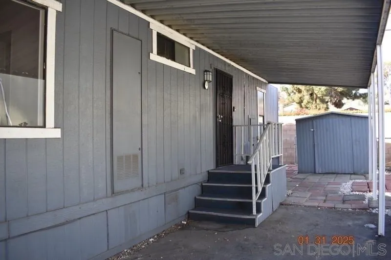 2515 Sweetwater Road, Unit 81 Spring Valley, CA 91977 - Photo 23 of 24 a view of entryway with wooden walls