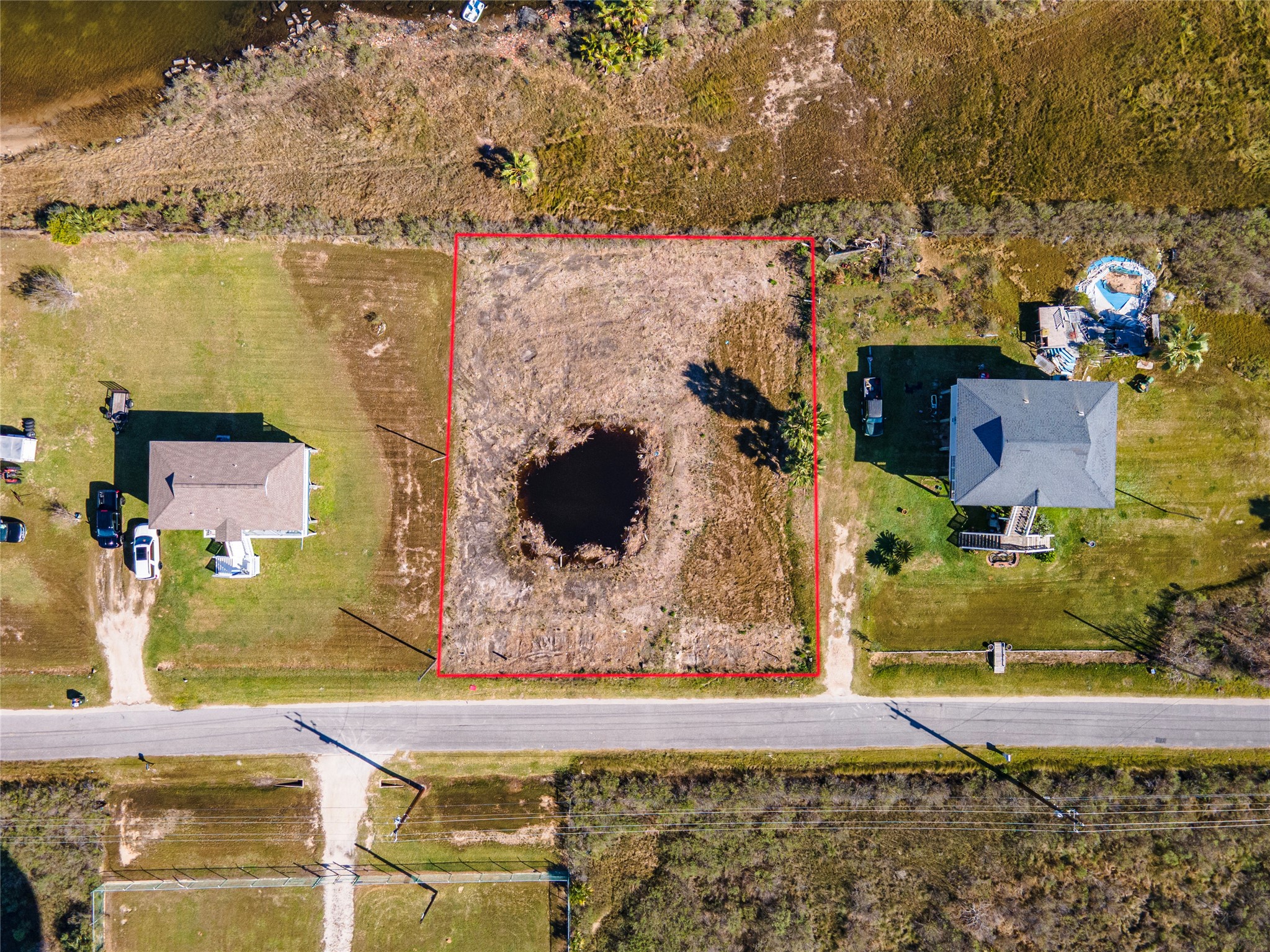 10 Mile Road Galveston, TX 77554 - Photo 12 of 12 an aerial view of residential houses with outdoor space