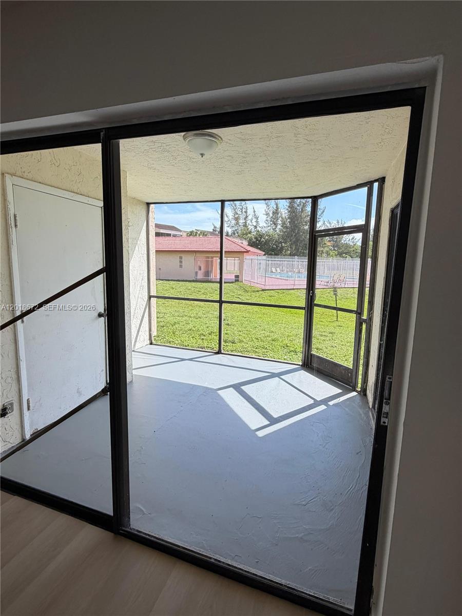 3400 Foxcroft Road, Unit 107 Miramar, FL 33025 - Photo 8 of 15 a room with a large window