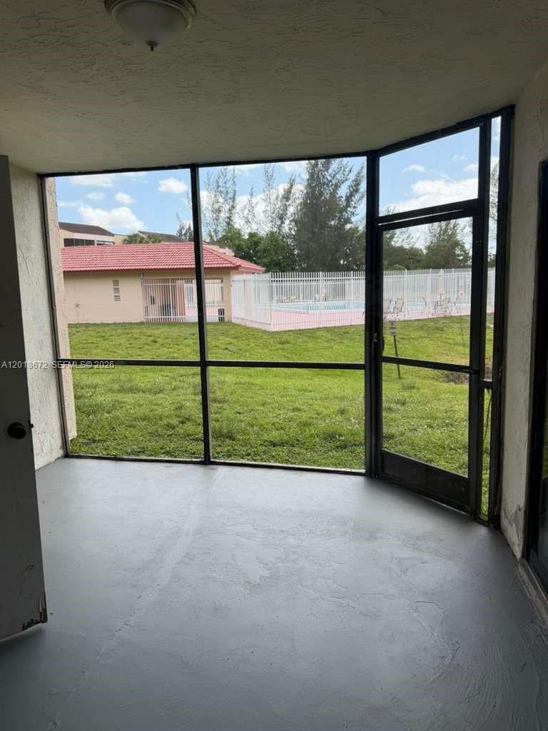 3400 Foxcroft Road, Unit 107 Miramar, FL 33025 - Photo 9 of 15 a view of a garden with an outdoor seating