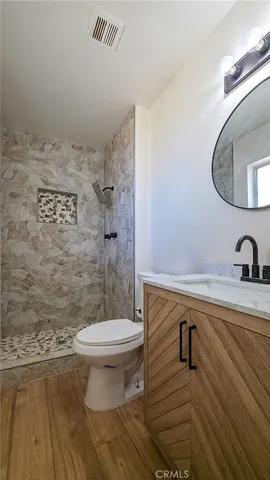 a bathroom with a sink and a toilet