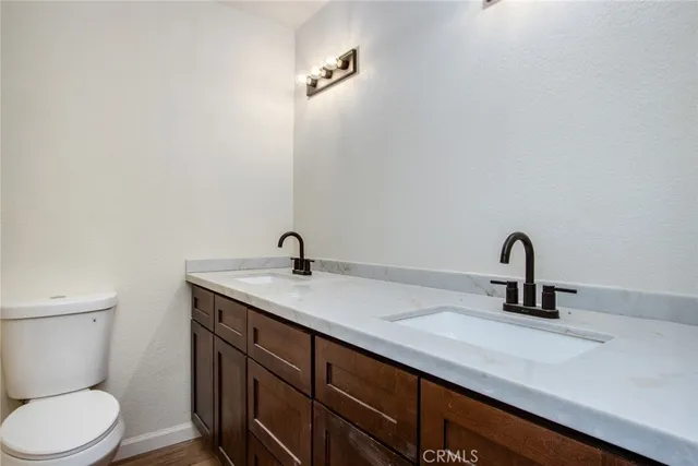 a bathroom with a sink and a toilet