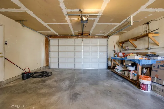 a view of a garage with storage