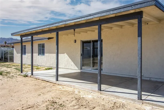 a view of swimming pool with seating space