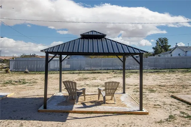 a view of chair and table in the patio