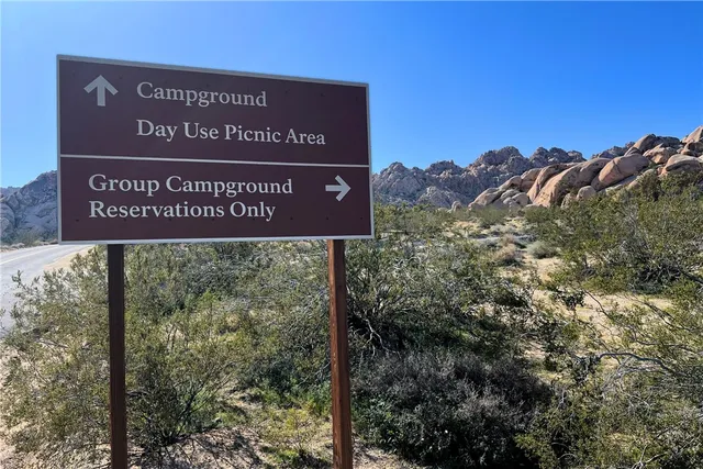 a sign on the side of the road