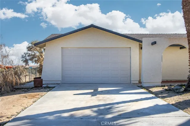 a view of a backyard of the house