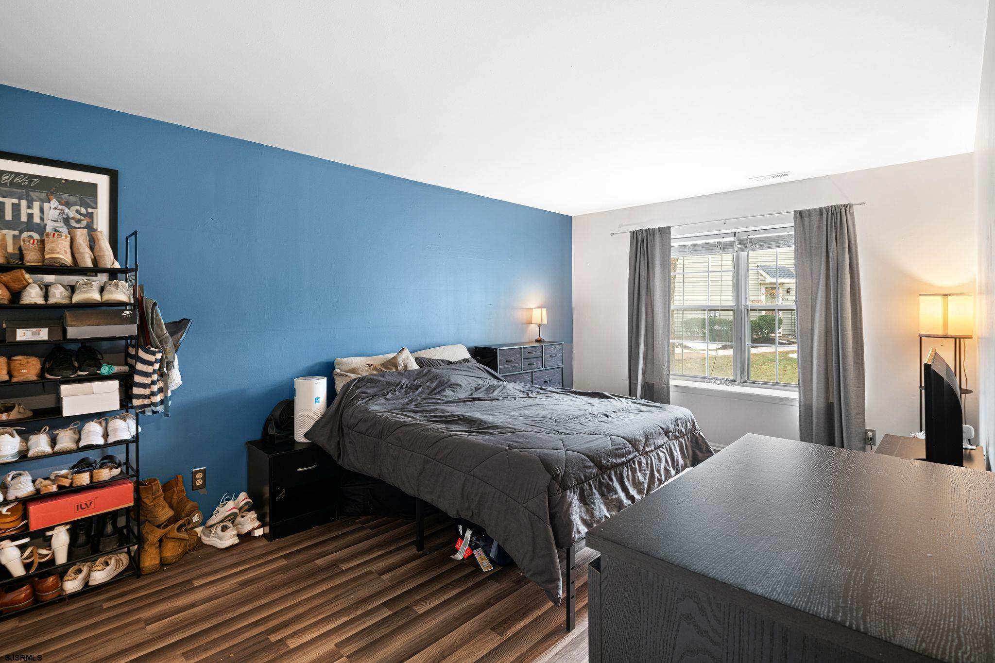 505 A Ralston Drive, Unit A Mount Laurel, NJ 08054 - Photo 12 of 18 a bedroom with a bed and a window