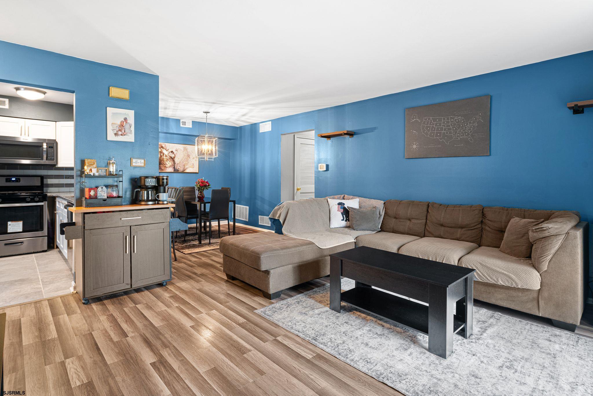 505 A Ralston Drive, Unit A Mount Laurel, NJ 08054 - Photo 7 of 18 a living room with a couch and a stove top oven
