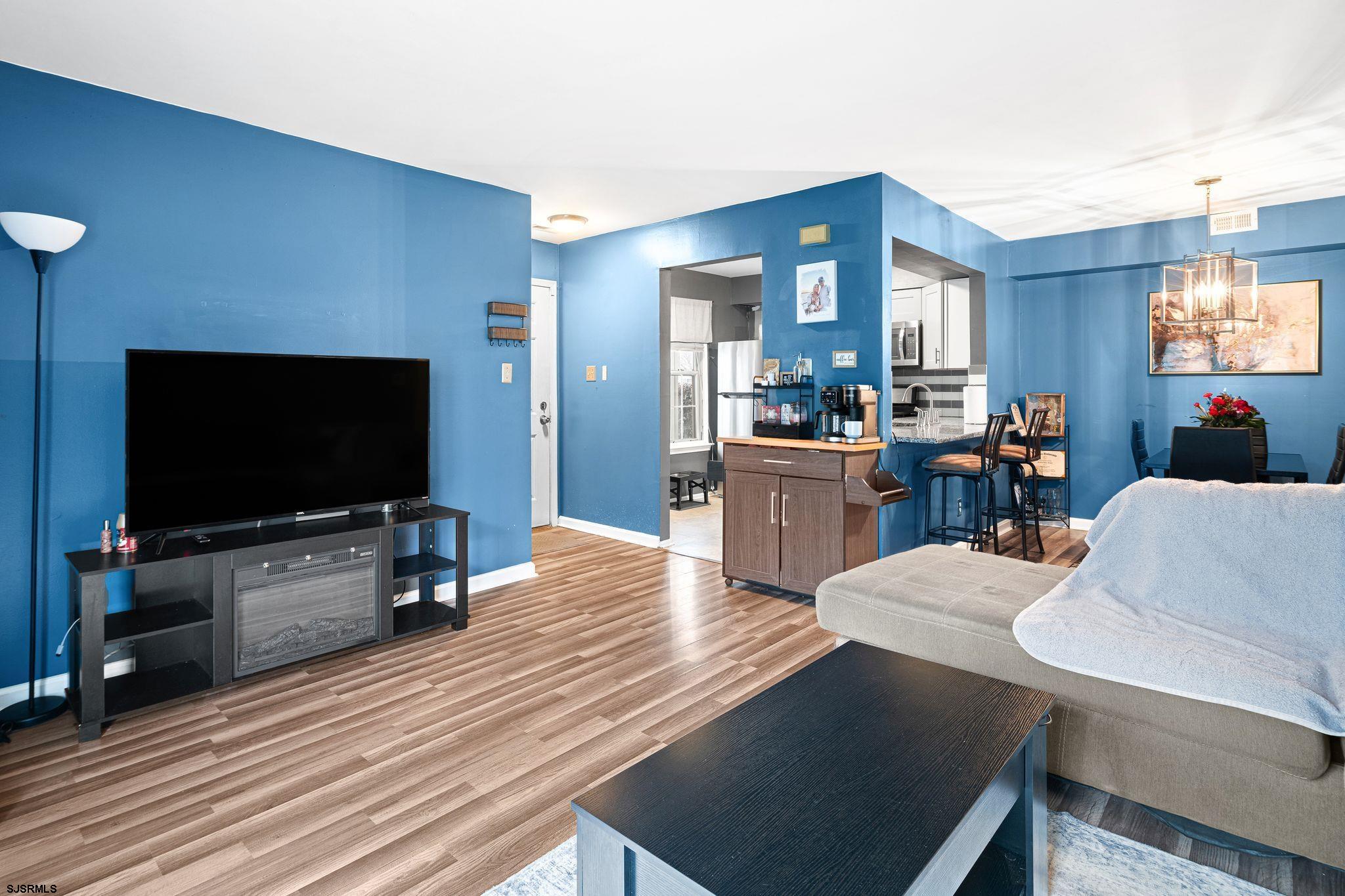 505 A Ralston Drive, Unit A Mount Laurel, NJ 08054 - Photo 8 of 18 a living room with furniture and a flat screen tv