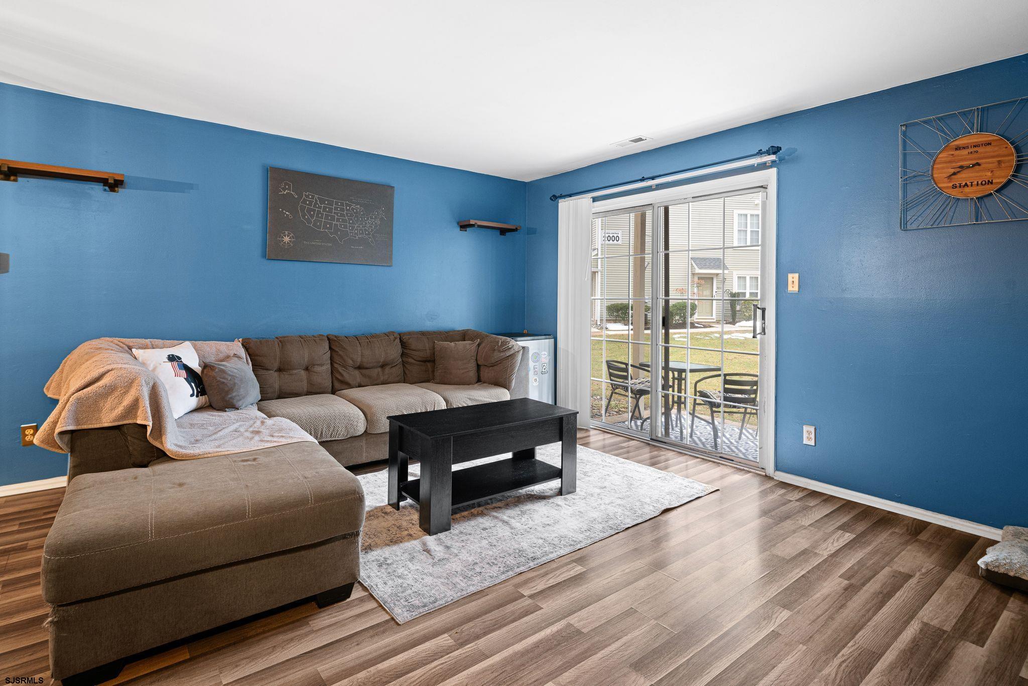 505 A Ralston Drive, Unit A Mount Laurel, NJ 08054 - Photo 10 of 18 a living room with furniture and a wooden floor