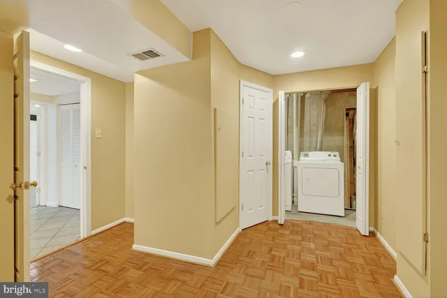 a view of a bathroom with a shower and a sink