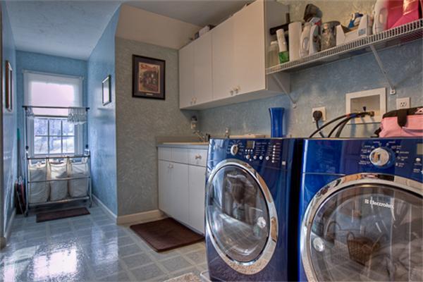 2 Split Rock Lane Hopkinton, MA 01748 - Photo 21 of 30 a view of storage and utility room with washer and dryer