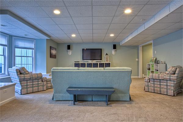 2 Split Rock Lane Hopkinton, MA 01748 - Photo 25 of 30 a living room with furniture and a flat screen tv