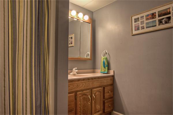 2 Split Rock Lane Hopkinton, MA 01748 - Photo 27 of 30 a bathroom with a sink a vanity and a mirror