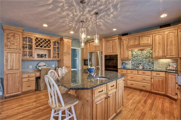 2 Split Rock Lane Hopkinton, MA 01748 - Photo 4 of 30 a kitchen with stainless steel appliances granite countertop a kitchen island hardwood floor sink stove dining table and chairs