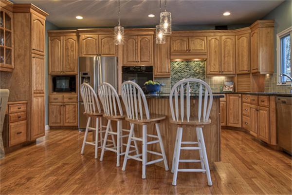 2 Split Rock Lane Hopkinton, MA 01748 - Photo 7 of 30 a kitchen with stainless steel appliances a dining table chairs and wooden floor