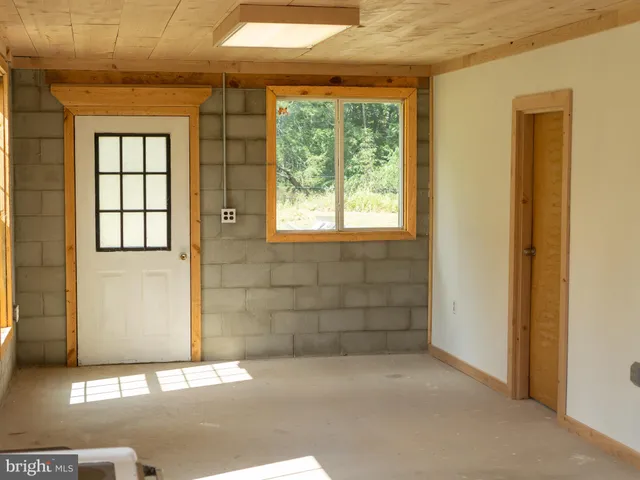 an empty room with windows