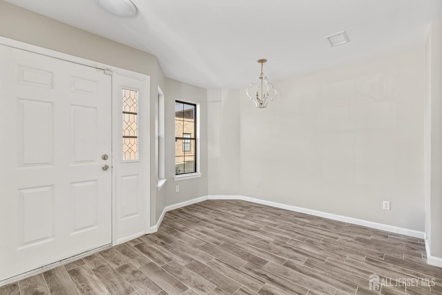 2301 Bayhead Drive Parlin, NJ 08859 - Photo 11 of 18 wooden floor in an empty room