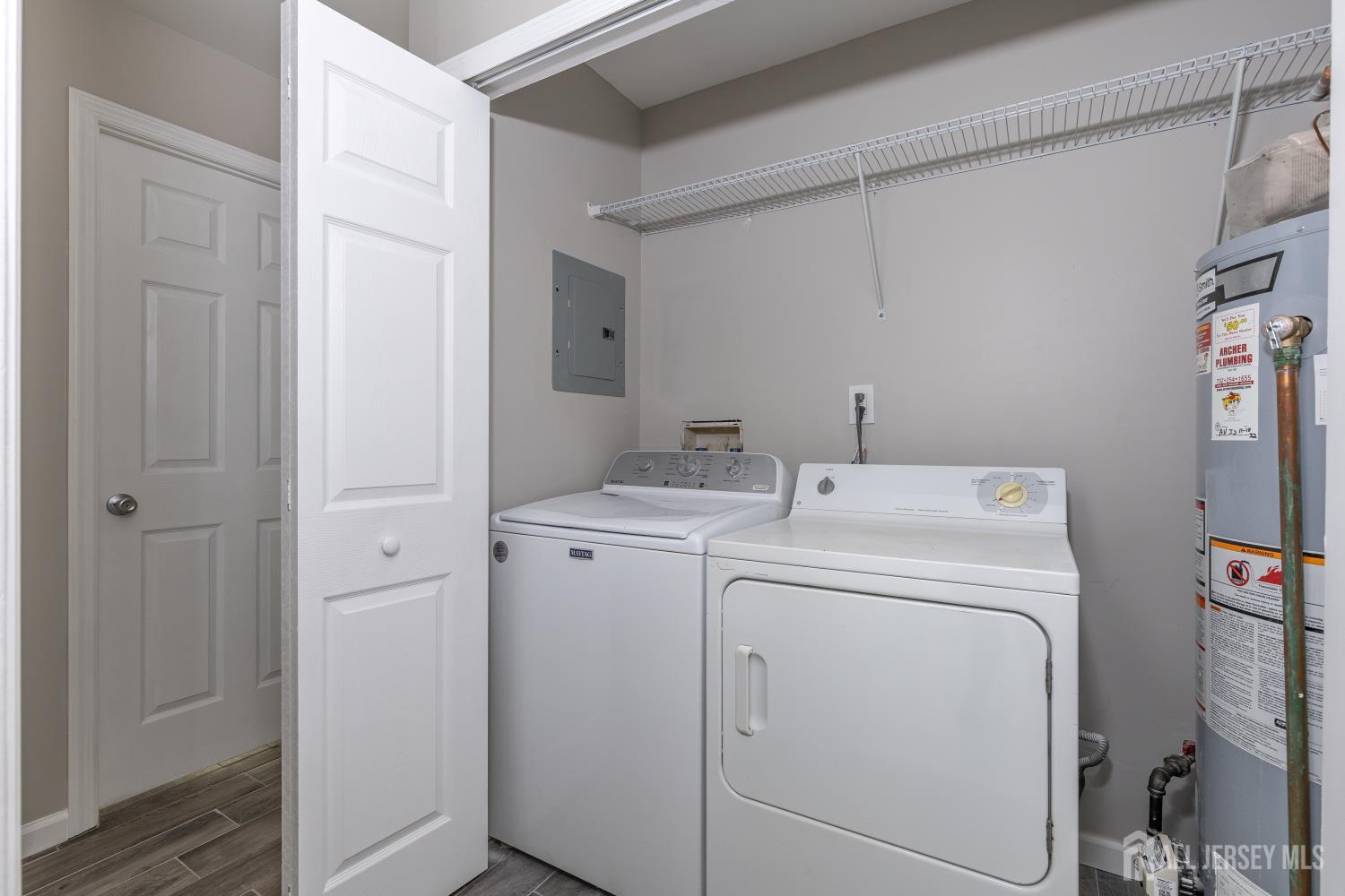 2301 Bayhead Drive Parlin, NJ 08859 - Photo 17 of 18 a utility room with dryer and washer