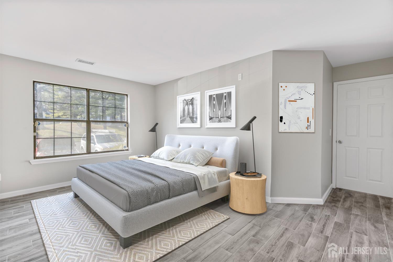 2301 Bayhead Drive Parlin, NJ 08859 - Photo 5 of 18 a bedroom with a bed and a window