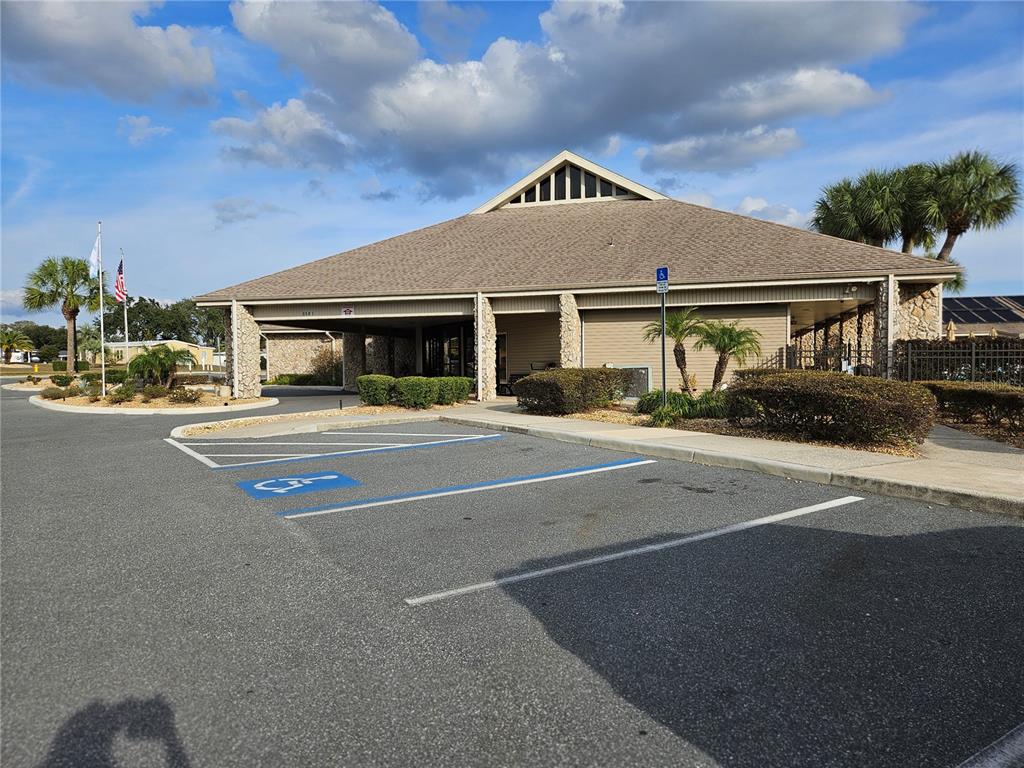 8480 Southwest 61st Terrace Road Ocala, FL 34476 - Photo 20 of 26 a front view of a building with parking