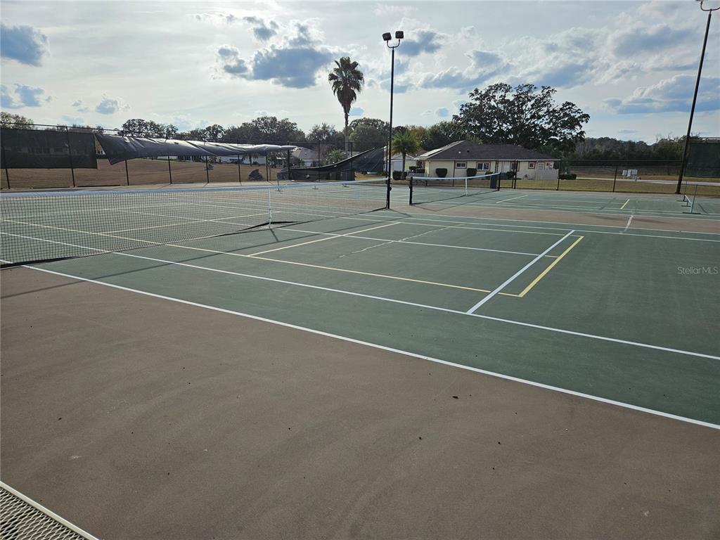 8480 Southwest 61st Terrace Road Ocala, FL 34476 - Photo 21 of 26 a view of a tennis court