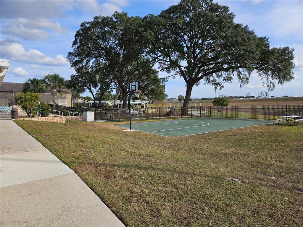 8480 Southwest 61st Terrace Road Ocala, FL 34476 - Photo 22 of 26 a view of outdoor space with garden and trees