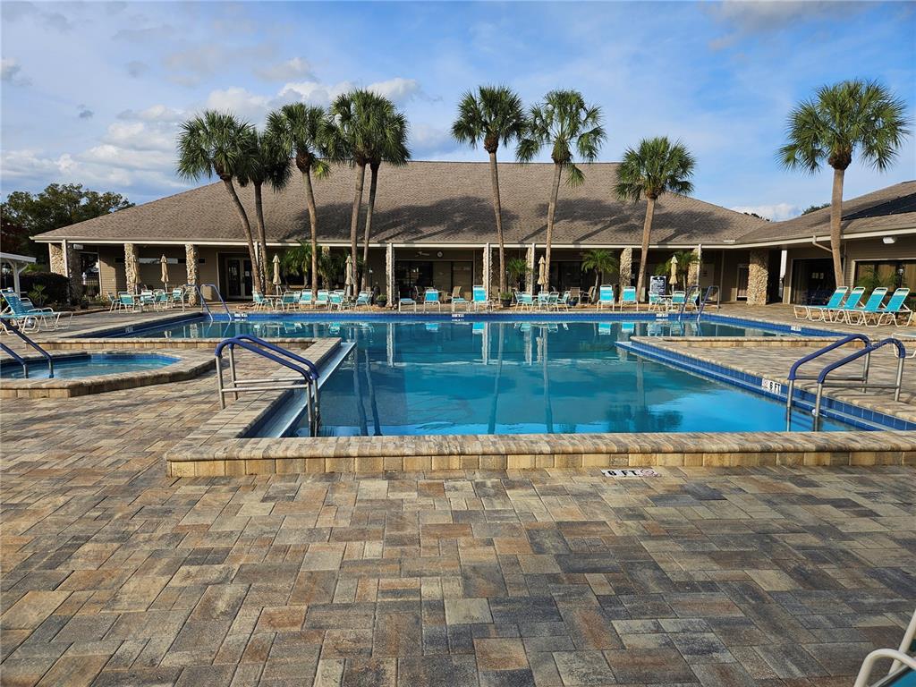 8480 Southwest 61st Terrace Road Ocala, FL 34476 - Photo 25 of 26 swimming pool view with seating space