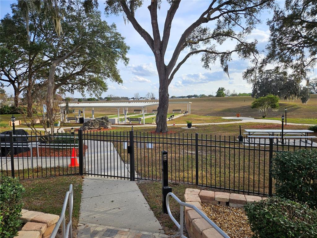 8480 Southwest 61st Terrace Road Ocala, FL 34476 - Photo 26 of 26 a view of a wrought iron fences with large trees