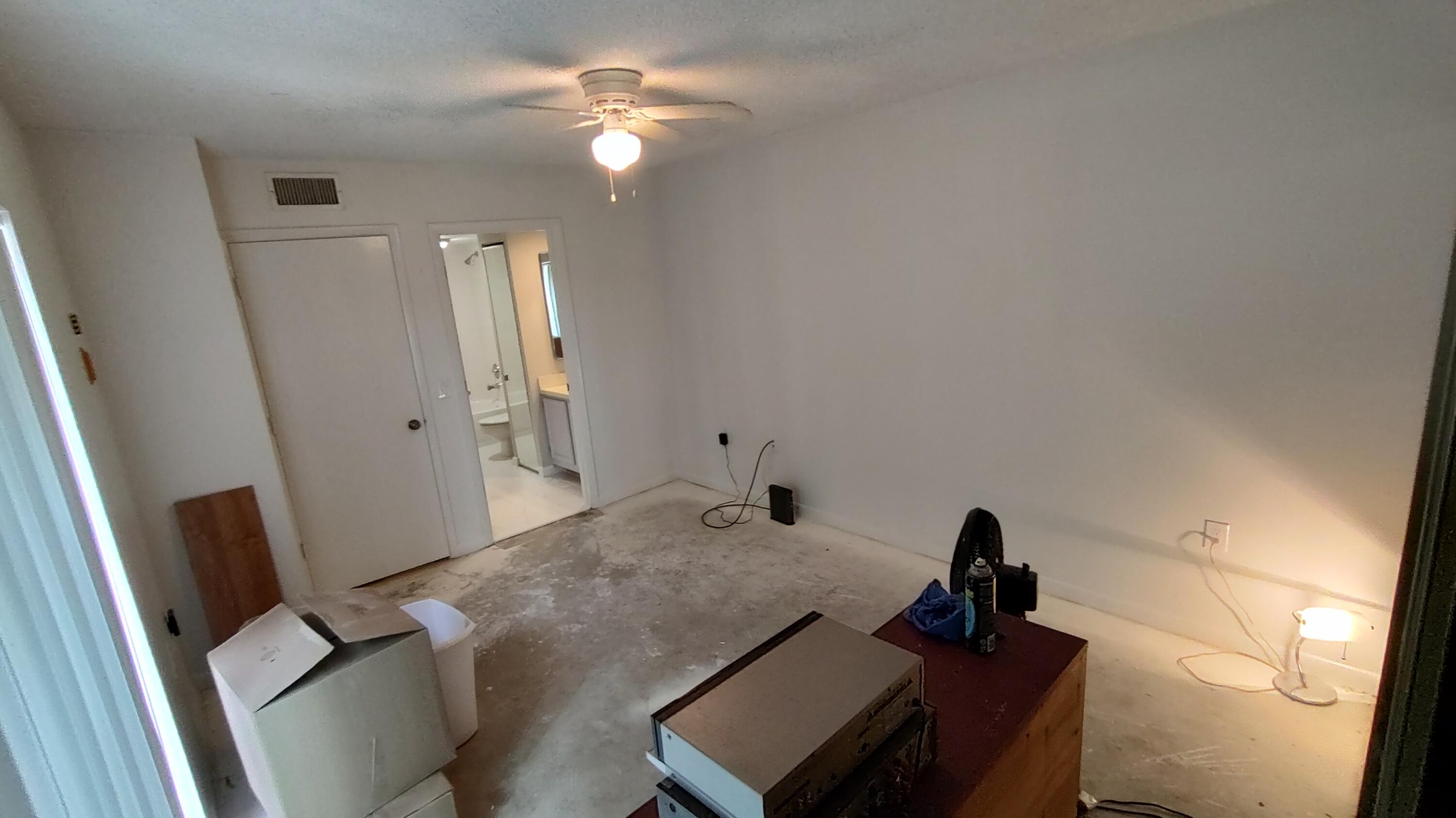 5646 Southeast Windsong Lane, Unit 415 Stuart, FL 34997 - Photo 12 of 20 a view of a living room and hardwood floor