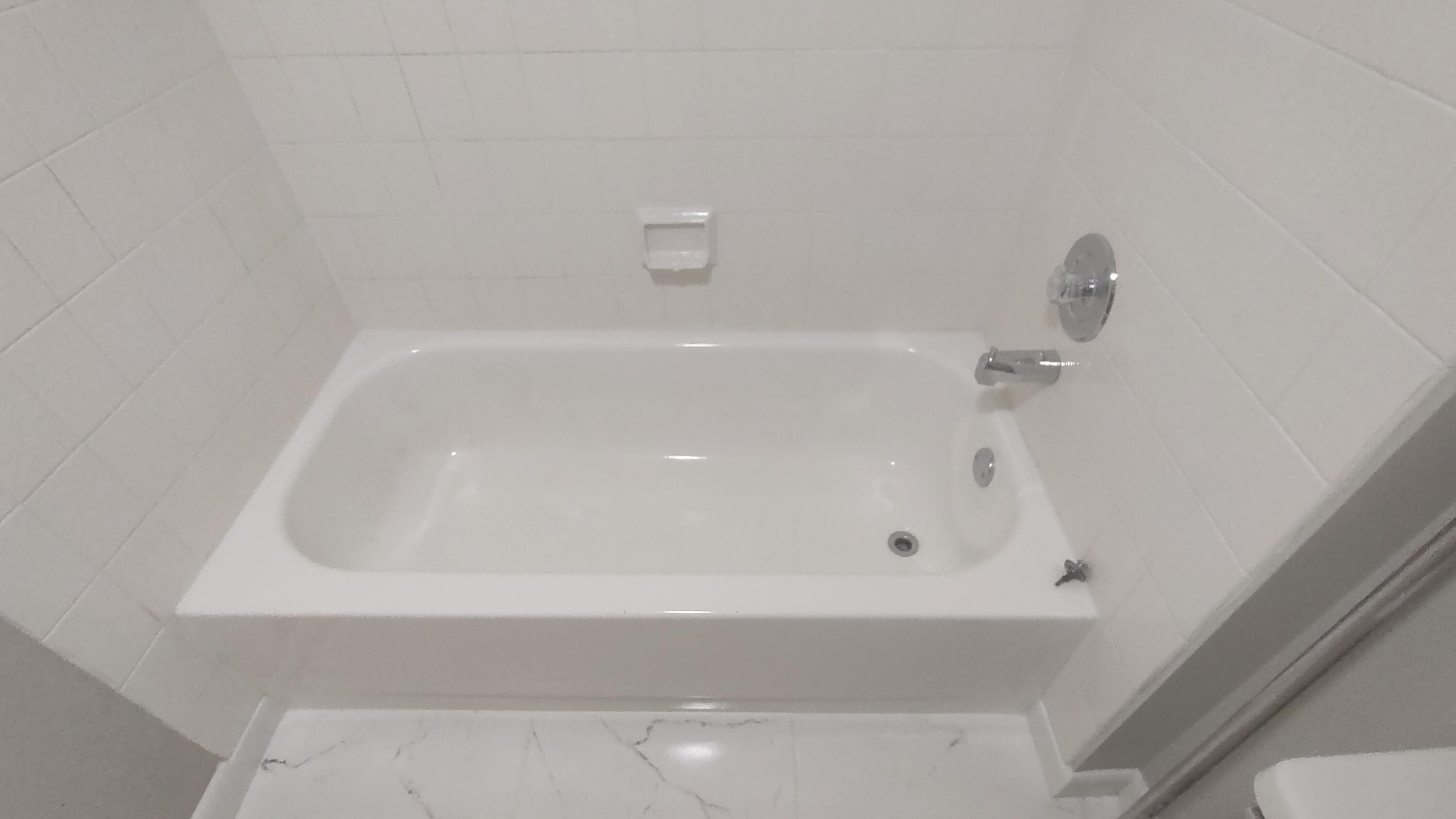 5646 Southeast Windsong Lane, Unit 415 Stuart, FL 34997 - Photo 15 of 20 a close view of a bathtub in bathroom